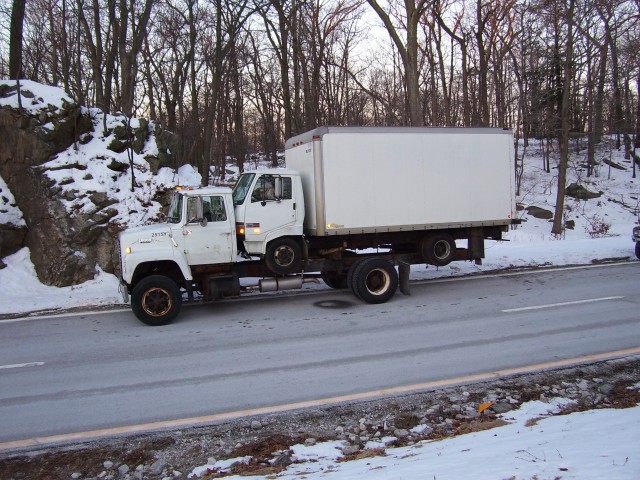 The tow vehicle--no--the box truck is not strapped down--and yes this is on the Taconic State Parkway