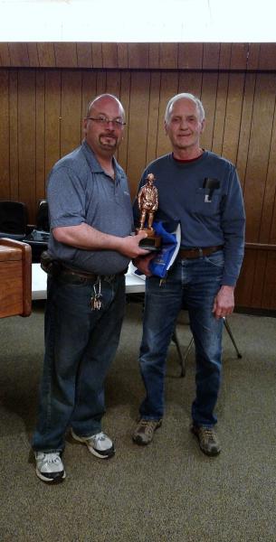 Chief Keeler presenting 50 year of service aware to Carl Boehmig - April Monthly Meeting - 2015